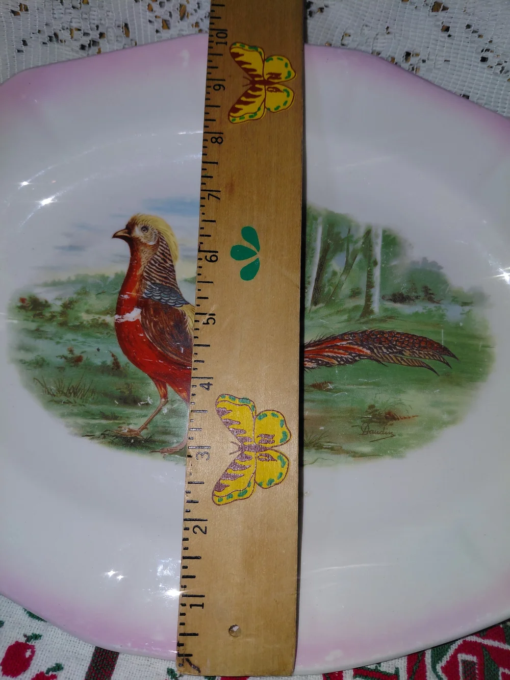 This 1924 antique S.P. Co Sebring hand-painted pheasant platter